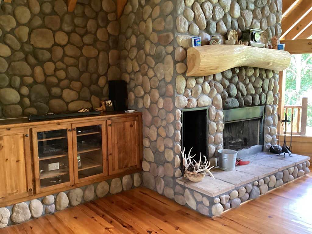Fireplace and TV goes over cabinet. 